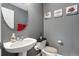 Small bathroom with gray walls and white vanity at 1160 Cardinal Ave, Brighton, CO 80601