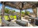 Relaxing patio with gazebo, seating, and fire pit at 1160 Cardinal Ave, Brighton, CO 80601