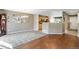 Open concept kitchen with light cabinets and a breakfast bar at 1160 Cardinal Ave, Brighton, CO 80601