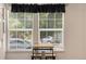 Small dining area with table and chairs near the kitchen at 1160 Cardinal Ave, Brighton, CO 80601