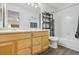 Main bathroom with double vanity and a tub at 1160 Cardinal Ave, Brighton, CO 80601