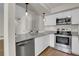 Kitchen with stainless steel appliances and granite countertops at 13619 E Yale Ave # C, Aurora, CO 80014