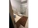 Bathroom with shower, toilet, and vanity with a granite top at 650 S Clinton St # 5B, Denver, CO 80247