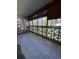 Sunroom with tiled floor and view of the outdoors at 650 S Clinton St # 5B, Denver, CO 80247