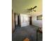 Bedroom with built-in shelving and wall-to-wall carpet at 650 S Clinton St # 5B, Denver, CO 80247