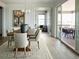 Dining room with a large wooden table and access to a deck at 16549 Black Rose Cir, Parker, CO 80134