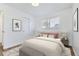 Charming bedroom with hardwood floors and neutral decor at 6335 Martin Luther King Jr Blvd, Denver, CO 80207