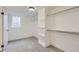 Bright and spacious basement closet with built-in shelving at 6335 Martin Luther King Jr Blvd, Denver, CO 80207