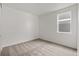 Spacious bedroom with neutral carpeting and a window at 9314 Quartz St, Arvada, CO 80007
