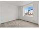 Bright bedroom with carpeted floor and large window at 9314 Quartz St, Arvada, CO 80007