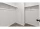 Large walk-in closet with double hanging rods and shelving at 9314 Quartz St, Arvada, CO 80007