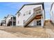 Two-story home with rear deck and stairs at 9314 Quartz St, Arvada, CO 80007