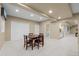 Finished basement with dining area and built-in storage at 7614 Crestview Dr, Niwot, CO 80504