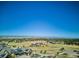 Panoramic aerial view of community and mountains at 8830 Witez Ct, Parker, CO 80134