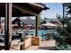 Resort-style pool with outdoor bar and lounge area at 8830 Witez Ct, Parker, CO 80134