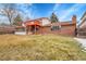 Backyard with deck, patio, and grassy area at 11326 E Berry Dr, Englewood, CO 80111