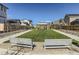 Community park with benches, grass, and a covered pavilion at 128 E Douglas St, Superior, CO 80027