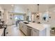 Large kitchen island with seating and a stylish sink at 128 E Douglas St, Superior, CO 80027