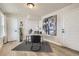 Bright home office with built-in shelving and large windows at 128 E Douglas St, Superior, CO 80027