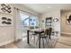 Charming dining area with a table for four and access to a balcony at 128 E Douglas St, Superior, CO 80027