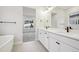 Double vanity bathroom with a view of bedroom at 5959 S Platte Canyon Dr, Littleton, CO 80123