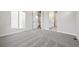 Simple bedroom with gray carpet and access to bathroom at 5959 S Platte Canyon Dr, Littleton, CO 80123