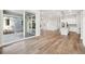Open concept dining area with hardwood floors and access to patio at 5959 S Platte Canyon Dr, Littleton, CO 80123