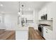 Modern kitchen with stainless steel appliances and an island at 5959 S Platte Canyon Dr, Littleton, CO 80123