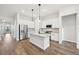 Modern kitchen features a center island and stainless steel appliances at 5959 S Platte Canyon Dr, Littleton, CO 80123