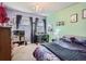 Charming bedroom with two-toned walls and a desk at 1056 S Harrison St, Denver, CO 80209