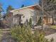 Modern home with updated facade, landscaping, and inviting walkway at 1056 S Harrison St, Denver, CO 80209