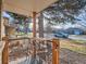 Small front porch with bistro set and view of the street at 1056 S Harrison St, Denver, CO 80209