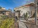 Front view of the house with walkway and seating area at 1056 S Harrison St, Denver, CO 80209