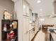Modern kitchen with updated cabinetry and granite countertops at 1056 S Harrison St, Denver, CO 80209
