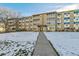 Exterior view of a two-story apartment building at 655 S Alton Way # 4B, Denver, CO 80247