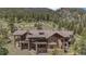 Luxury home with mountain views and expansive deck at 456 Crystal Ridge Rd, Evergreen, CO 80439