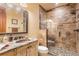 Bathroom with granite vanity and walk-in shower at 456 Crystal Ridge Rd, Evergreen, CO 80439