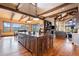 Spacious kitchen features a large island, custom cabinetry, and stunning views at 456 Crystal Ridge Rd, Evergreen, CO 80439