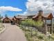 Luxury home with stone and wood accents, mountain views at 456 Crystal Ridge Rd, Evergreen, CO 80439