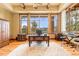 Home office with large windows and mountain views at 456 Crystal Ridge Rd, Evergreen, CO 80439