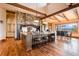 Gourmet kitchen boasts a large island, custom cabinetry, and high-end appliances at 456 Crystal Ridge Rd, Evergreen, CO 80439