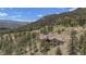 Luxury home on mountainside with mountain views at 456 Crystal Ridge Rd, Evergreen, CO 80439