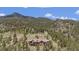 Luxury mountain home with mountain views and large lot at 456 Crystal Ridge Rd, Evergreen, CO 80439