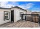 Private deck with access to the backyard at 1517 W Nevada Pl, Denver, CO 80223