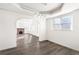 Elegant dining room with hardwood floors and an archway at 1517 W Nevada Pl, Denver, CO 80223