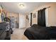 Cozy bedroom with a double bed and ample closet space at 6589 W Louisiana Pl, Lakewood, CO 80232