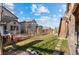 Landscaped backyard with stone pathway at 16325 Spanish Peak Way, Broomfield, CO 80023