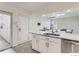 Kitchen with marble countertops and stainless steel appliances at 3212 S Oneida Way, Denver, CO 80224