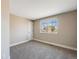 Spacious bedroom with neutral walls and a large window at 5256 S Ukraine St, Aurora, CO 80015