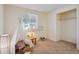 Bedroom with carpet, window, and closet at 1723 Robb St # 20, Lakewood, CO 80215